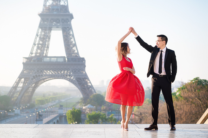 Dancing twirling in front of the Eiffel Tower