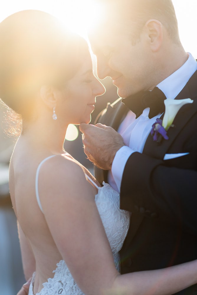 Creative wedding portrait of elegant groom and beautiful bride in the afternoon sun on the Alexander 3 bridge in Paris Creative wedding portrait of elegant groom and beautiful bride in the afternoon sun on the Alexander 3 bridge in Paris