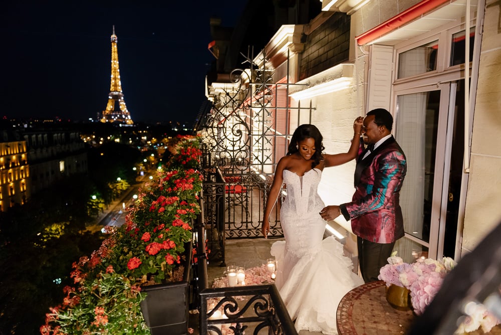 Newlywed couple first dance on the Hotel Plaza Athenee Paris balcony Newlywed couple first dance on the Hotel Plaza Athenee Paris balcony
