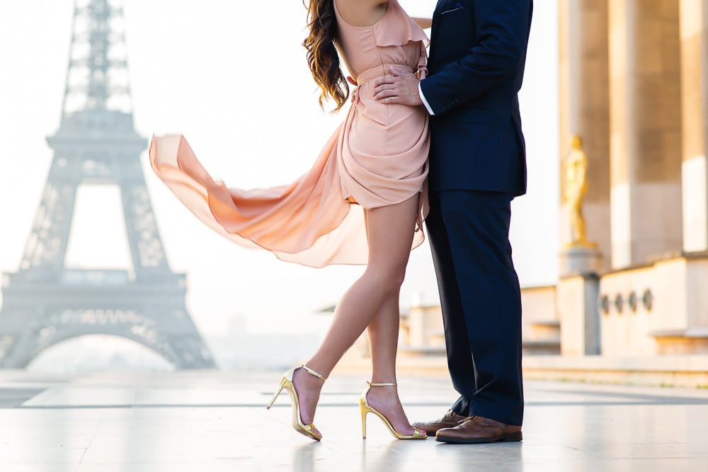 Romantic picture with a flowy dress in front of the Eiffel Tower Romantic picture with a flowy dress in front of the Eiffel Tower