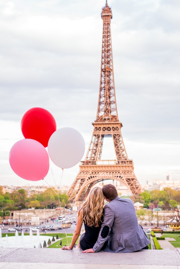 paris eiffel tower couple pictures Young couple in love at eiffel tower
stock photo